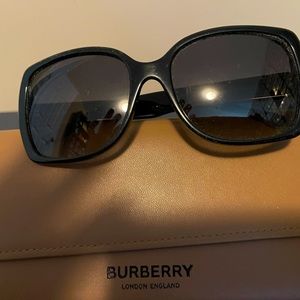Barely worn Burberry sunglasses with case authentic. See pictures for lens condi